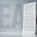 Surrealist poster of a businesswoman leaning against a giant lease contract with one clause circled in red
