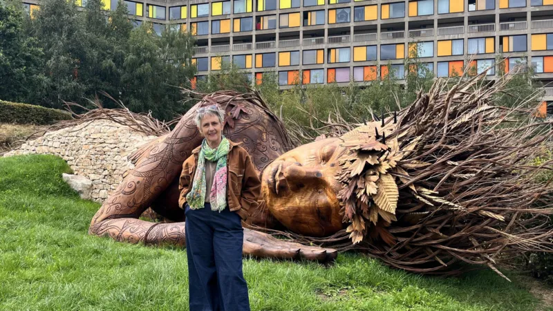 Landscape designer Sarah Eberle with her Gaia sculpture at Park Hill in Sheffield