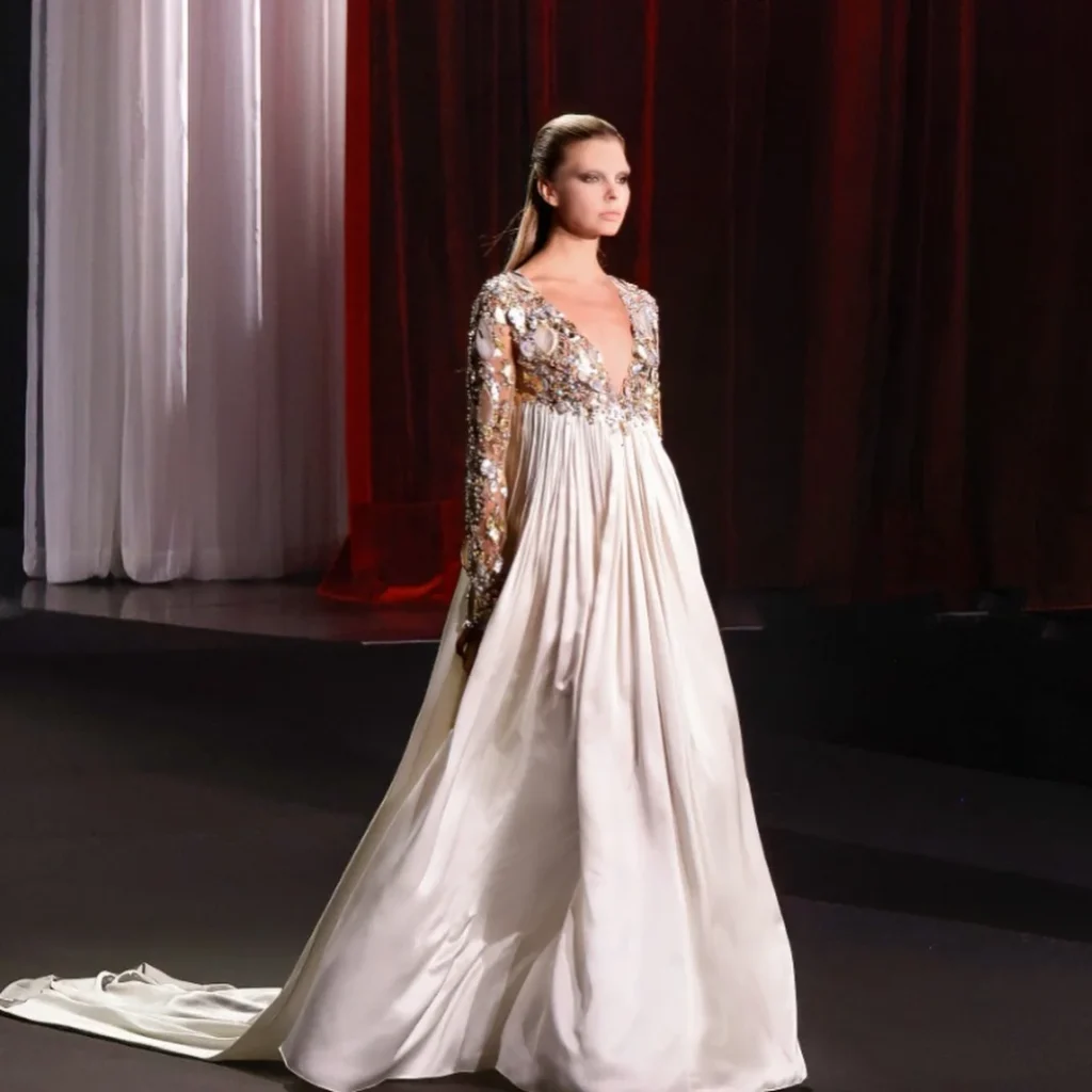 ivory empire gown with crystal-embroidered plunging bodice