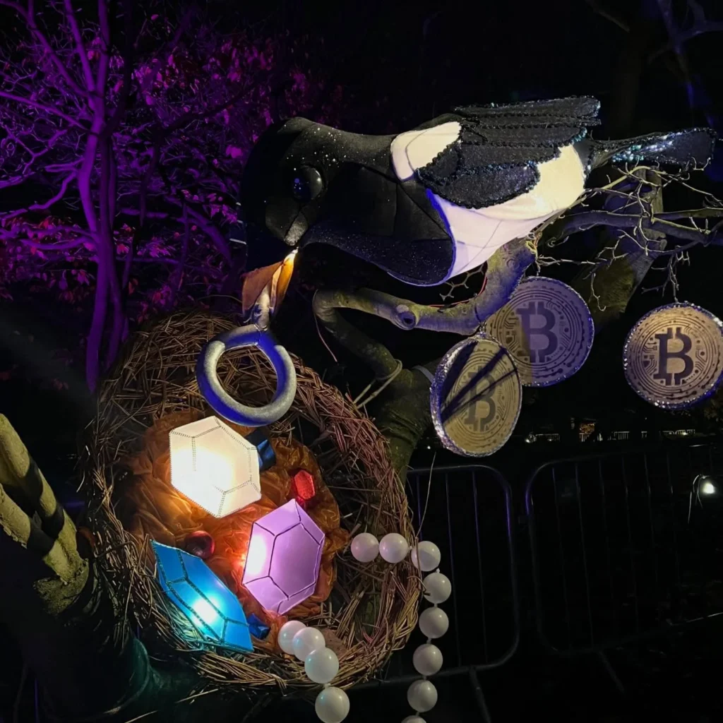 Red squirrel and magpie lantern installations from an illuminated trail