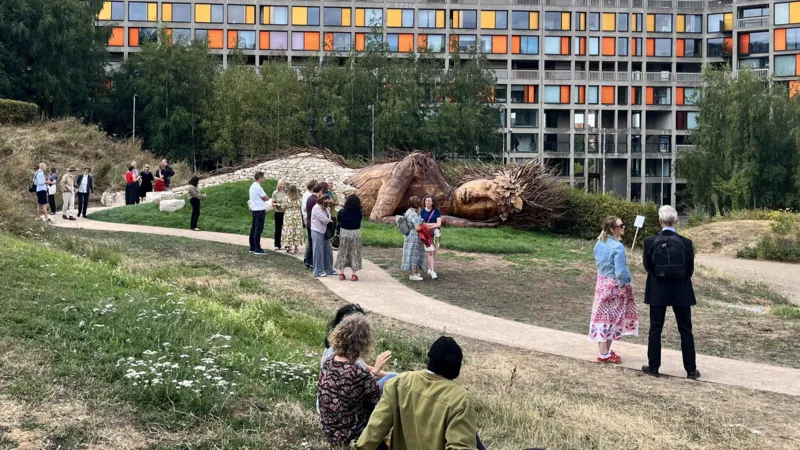 Visitors at the opening of the On the Edge garden installation at Park Hill, Sheffield