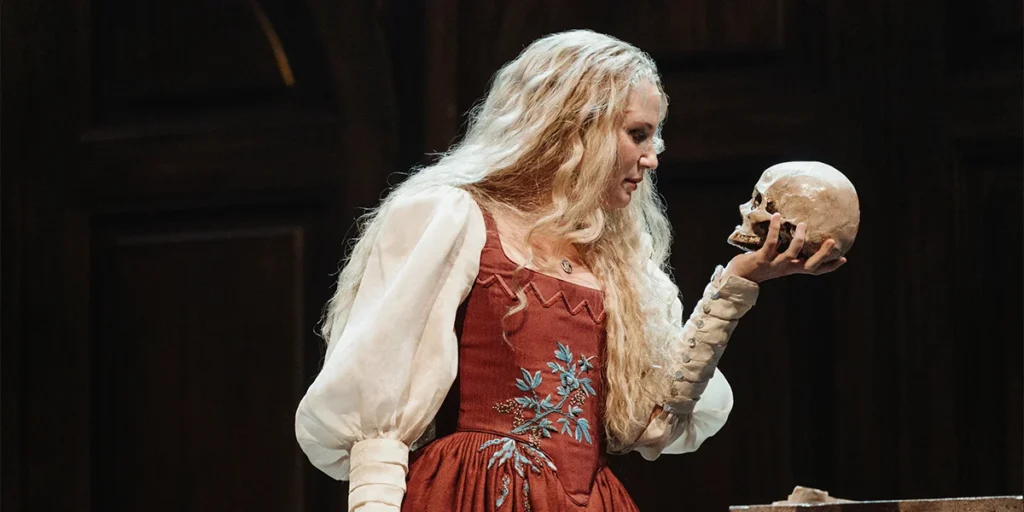 Nettles' Giulia contemplating a skull, the show at its most Hamlet-adjacentv