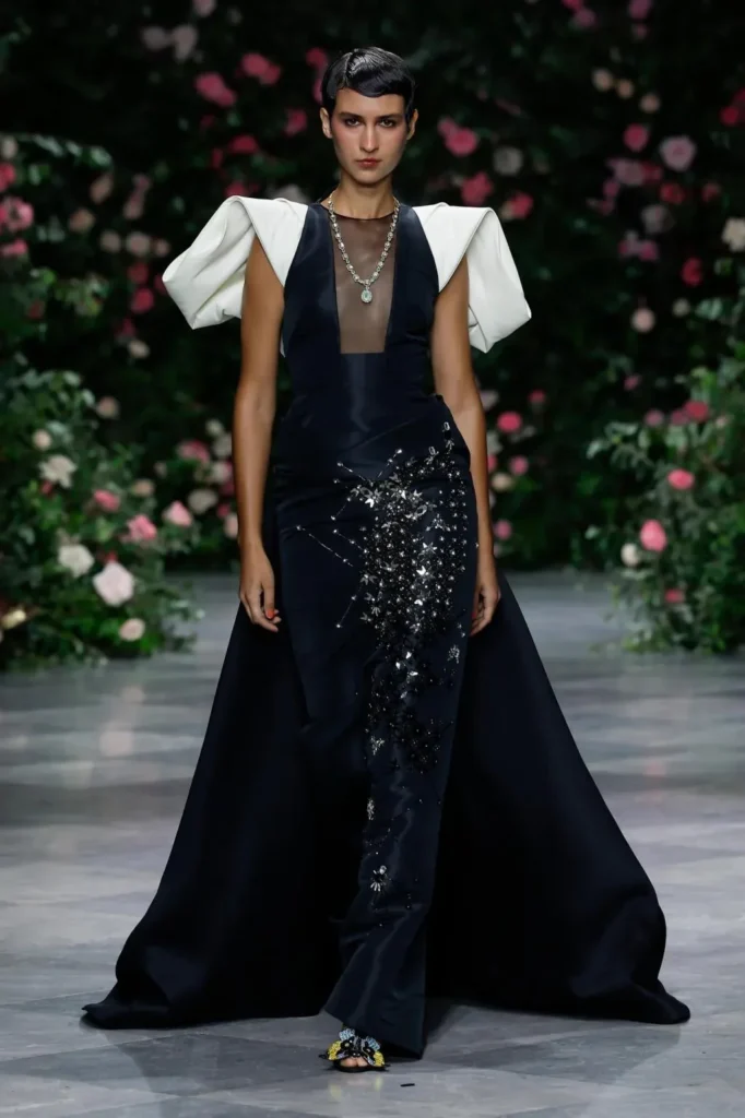 Look from the Bibhu Mohapatra Spring 2027 runway against the rose wall (2)