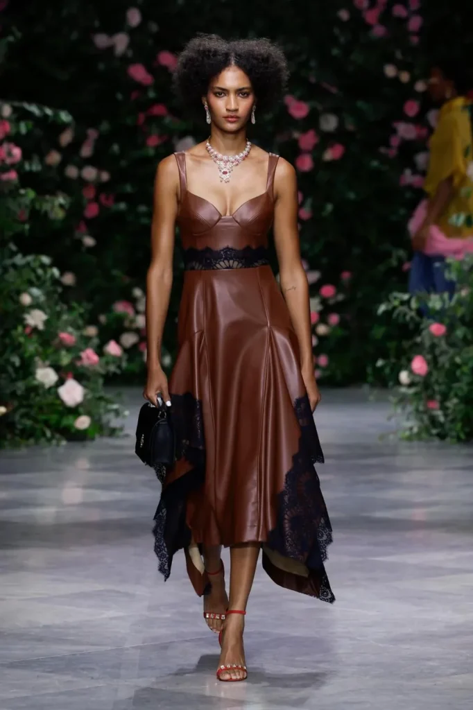 Look from the Bibhu Mohapatra Spring 2027 runway against the rose wall (2)