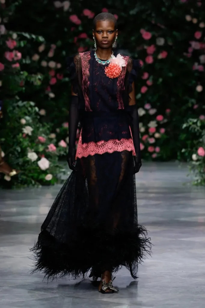 Look from the Bibhu Mohapatra Spring 2027 runway against the rose wall