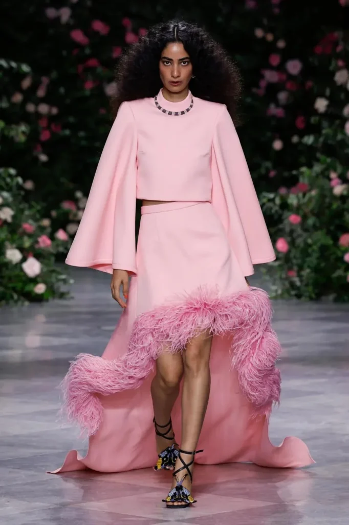 Look from the Bibhu Mohapatra Spring 2027 runway against the rose wall