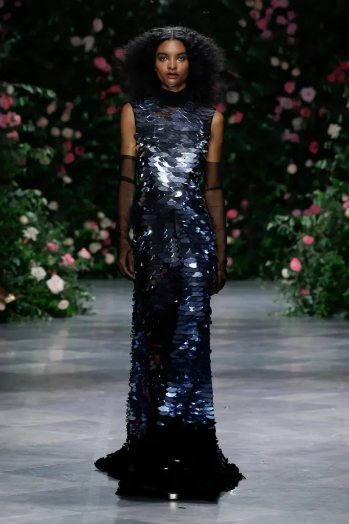 Look from the Bibhu Mohapatra Spring 2027 runway against the rose wall