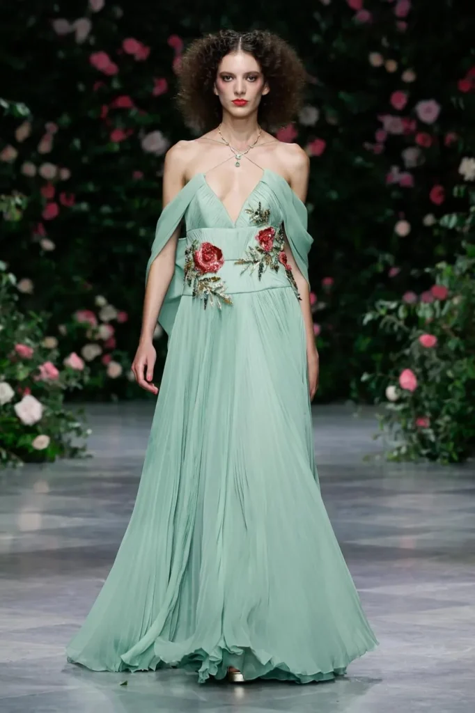 Look from the Bibhu Mohapatra Spring 2027 runway against the rose wall