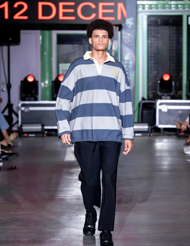 blue and gray striped rugby shirt with cream collar